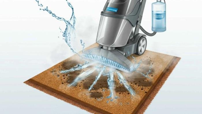 Professional carpet being cleaned using steam cleaning method with hot water extraction